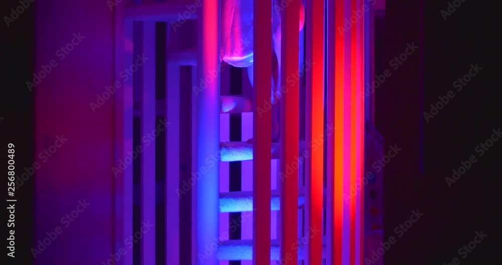 Girl walking down spiral staircase at party or music video Girl walking down spiral staircase at party or music video