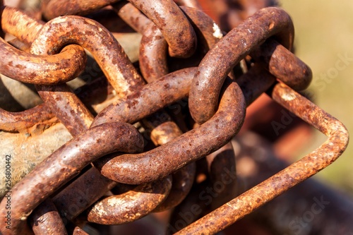 Old rusty chain. Rusted anchor chain. Material corrosion.