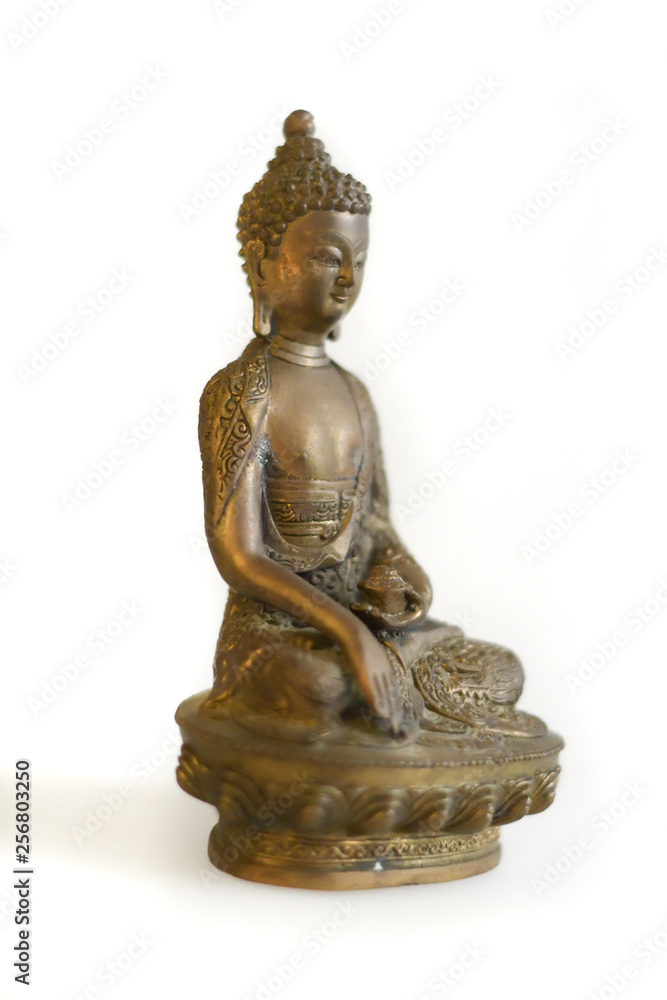 Copper Buddha on a white background