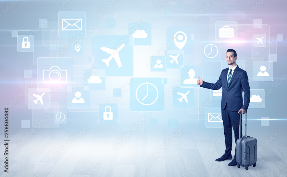 Businessman departs to a business trip with social media and travel symbol concept
Businessman departs to a business trip with social media and travel symbol concept