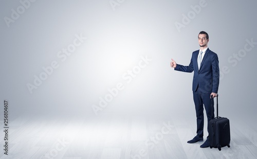 Lonely businessman hitchhikes concept with copy space around him   © ra2 studio