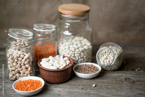Beans, chickpeas, lentils, legumes in glass jars