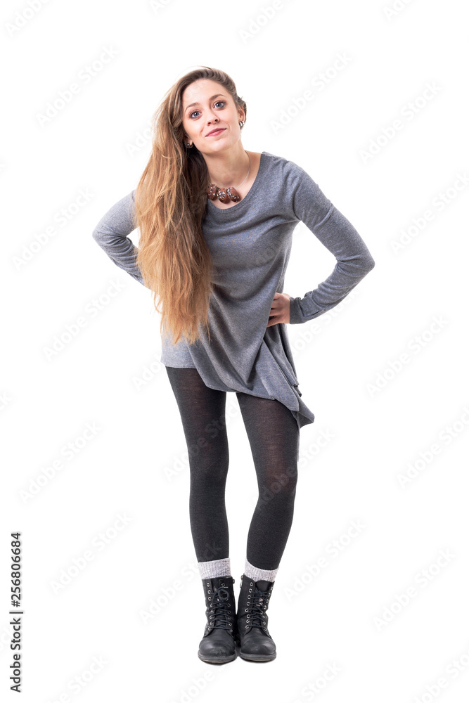 Playful cute curious woman bending and looking at camera at attention. Full body isolated on white background. Playful cute curious woman bending and looking at camera at attention. Full body isolated on white background.