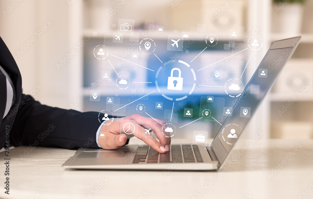 Business woman below chest working on laptop in a cozy homey environment with secured connection concept
Business woman below chest working on laptop in a cozy homey environment with secured connection concept