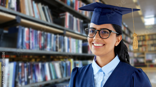 Photography education, graduation and people concept - happy female graduate student in mort