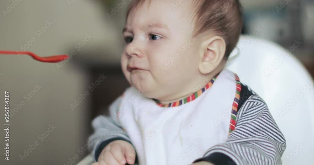 Child boy is naughty at the table Child boy is naughty at the table
