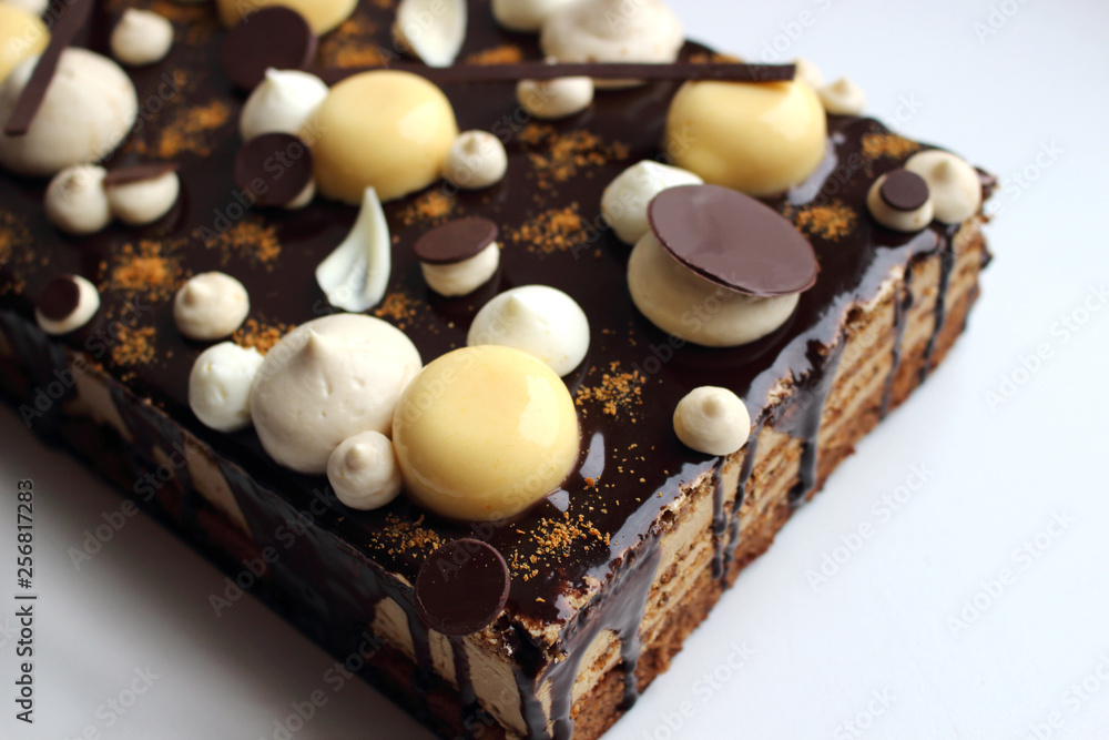 Hazelnut and citrus coffee sheet cake with orange mousse and dark chocolate mirror glaze Hazelnut and citrus coffee sheet cake with orange mousse and dark chocolate mirror glaze