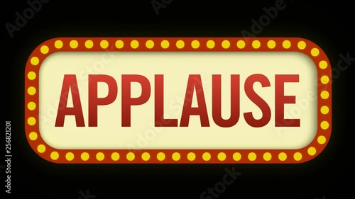 Applause sign flickering on and off to prompt the audience to clap