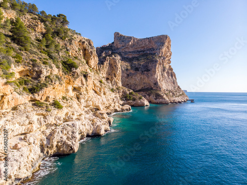 Cliffs in Moraig cove beach in Benitatxell, Alicante, Spain