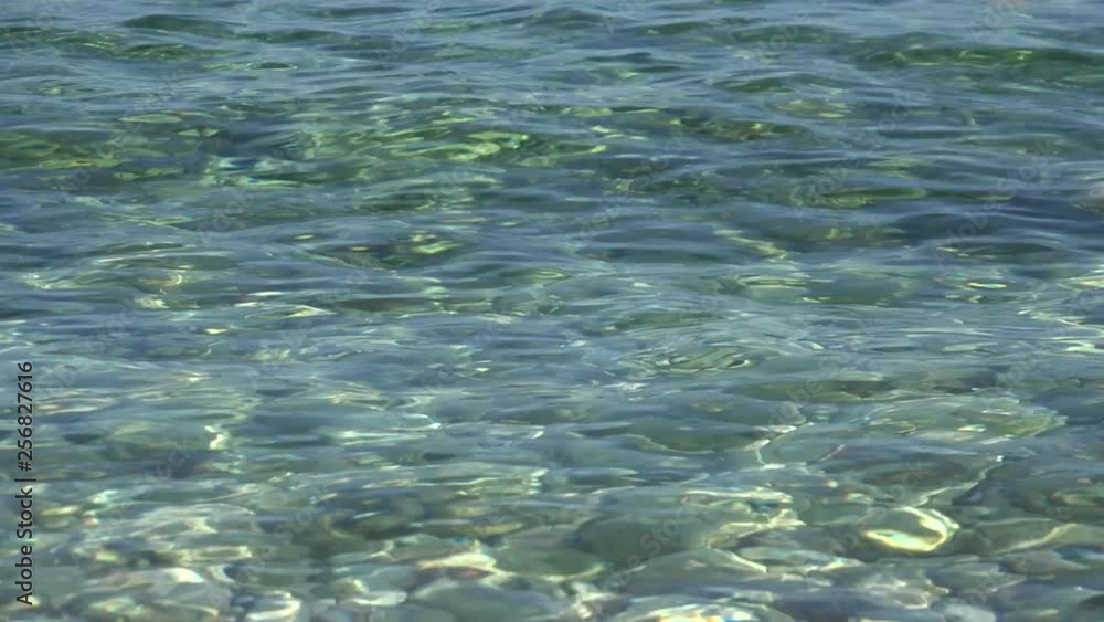 Greece Beach with Blue Waves Crashes on Seashore, Seascape View in Summer Greece Beach with Blue Waves Crashes on Seashore, Seascape View in Summer