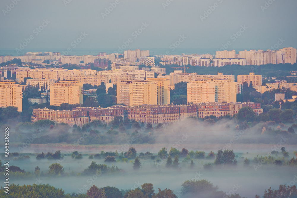 Φωτογραφία Warsaw foggy city and block of flates with sunrise beautiful colors