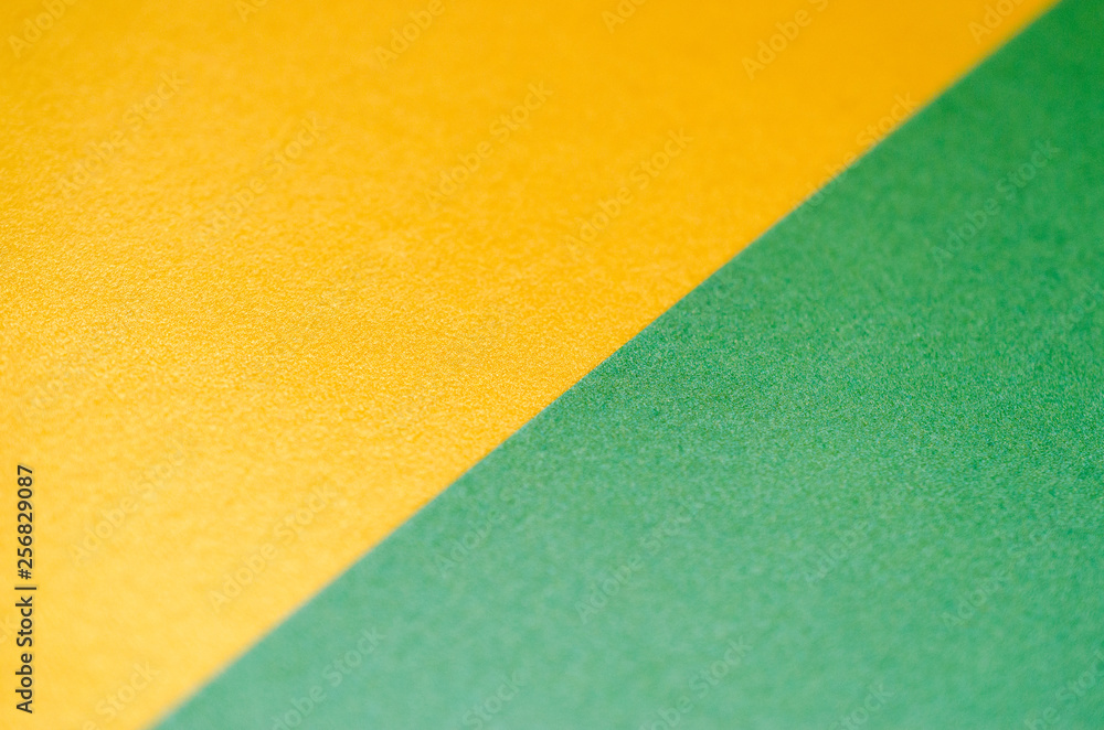 Fototapeta premium Gold and green paper texture background.