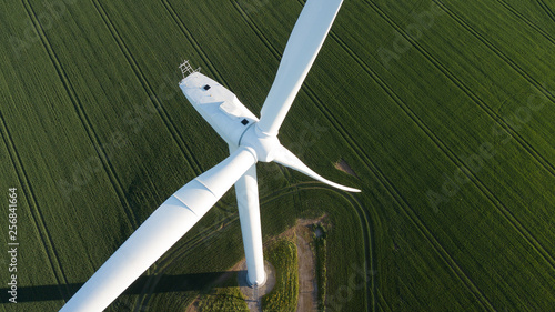 photos of wind turbines providing renewable green energy in england in the country side photo