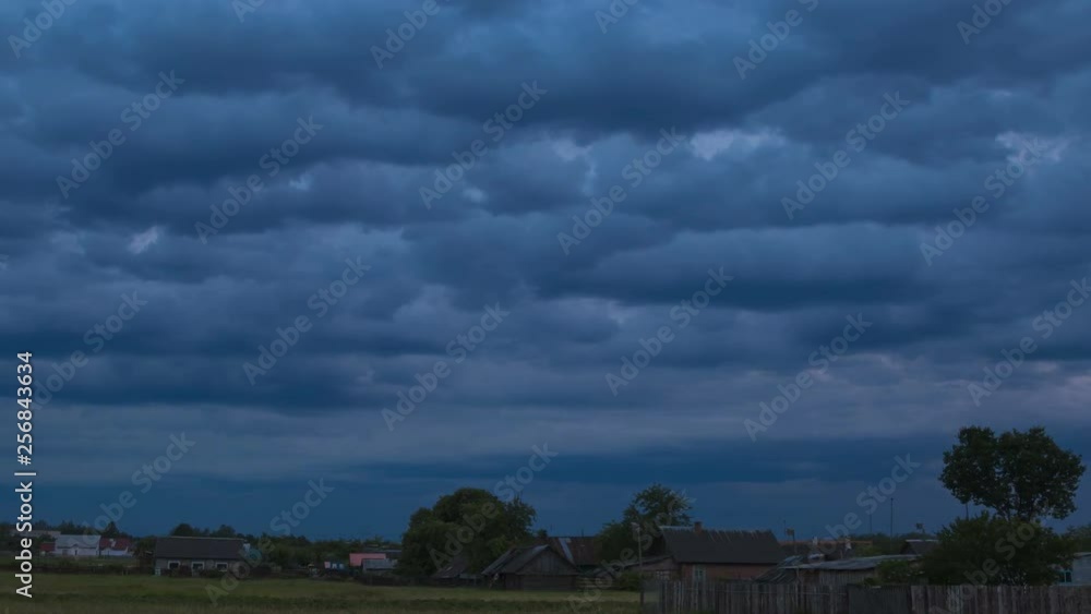 Rural landscape with storm clouds, dramatic sky, time lapse Rural landscape with storm clouds, dramatic sky, time lapse