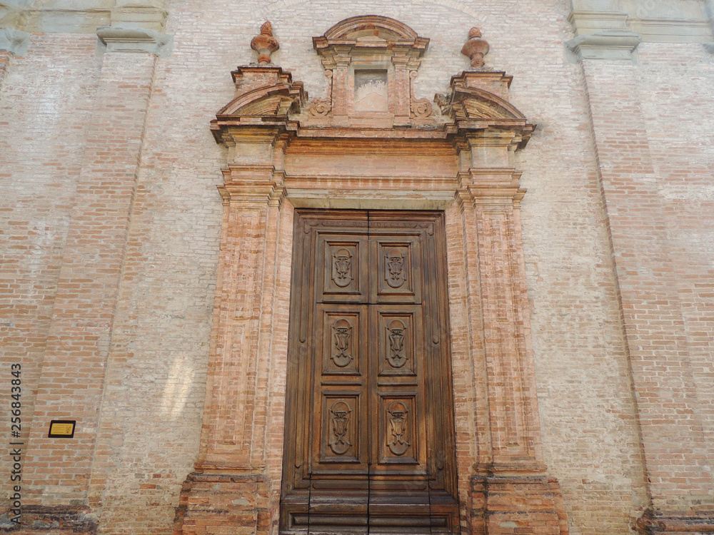 Details and door of the Church of Santa Croce in Umbertide, Umbria, Italy.