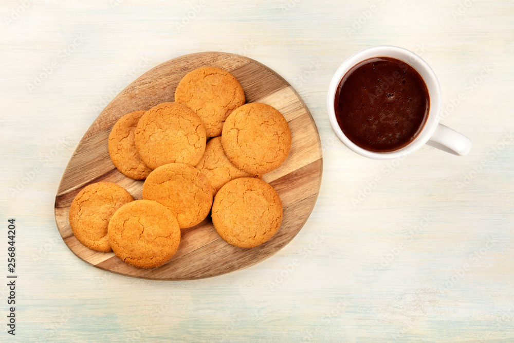 Ginger cookies, shot from the top with a cup of hot chocolate and copy space Ginger cookies, shot from the top with a cup of hot chocolate and copy space