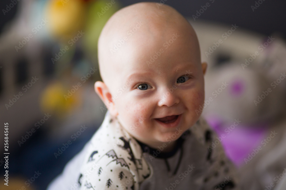 the baby is laughing in his crib the baby is laughing in his crib