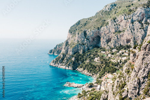 Capri coast view. Beautiful island beach with rocks