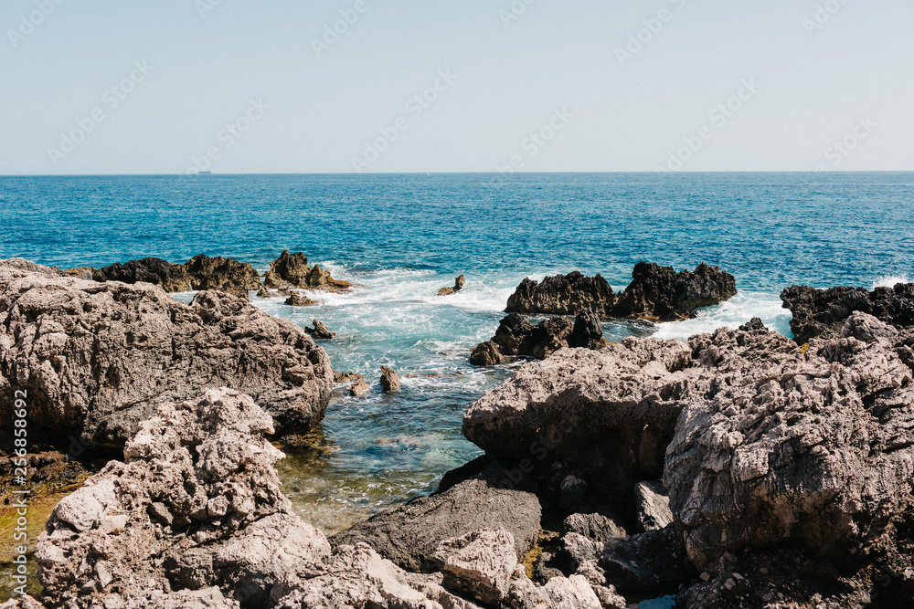 Capri coast view. Beautiful island beach with rocks