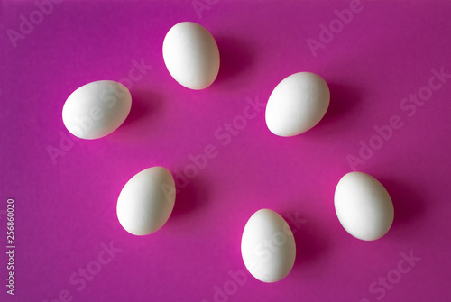top view frame from Easter eggs on purple background