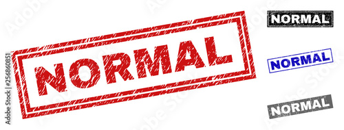 Grunge NORMAL rectangle stamp seals isolated on a white background. Rectangular seals with grunge texture in red, blue, black and gray colors.