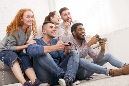 Students playing video games online at home