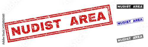 Grunge NUDIST AREA rectangle stamp seals isolated on a white background. Rectangular seals with grunge texture in red, blue, black and gray colors.