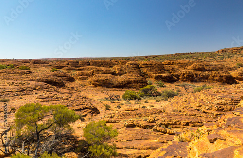 Colorful sandstone mountains in Kings Canyon during dry summer time. Australia.