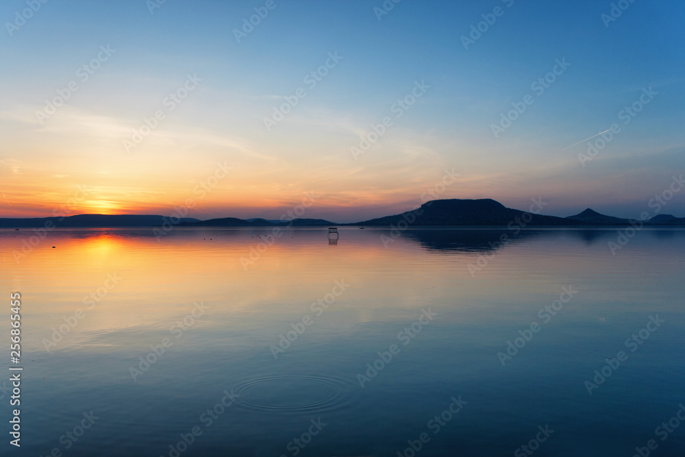 Lake Balaton after sunset with the Badacsony mountains in the background