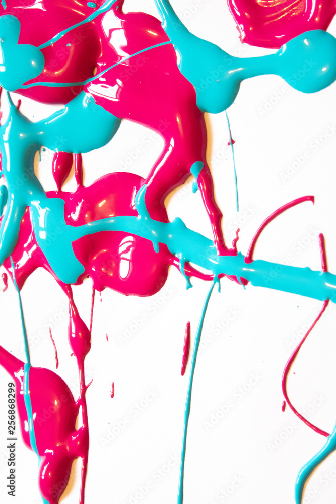 Fototapeta premium Pink And Blue Paint Spatters on White Background