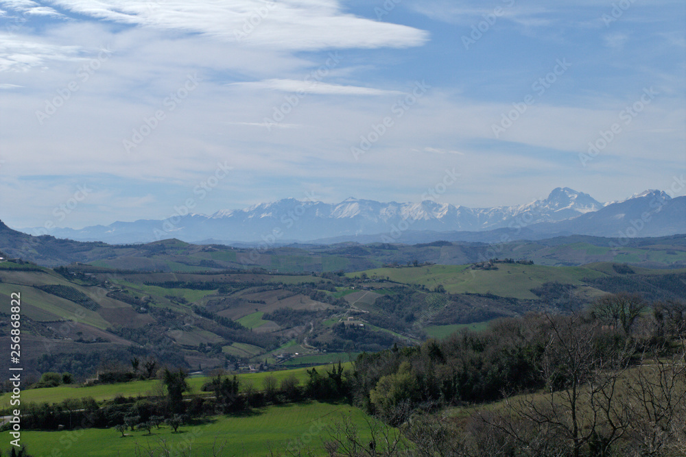 landscape in the mountains,italy,spring,countryside,rural,panoramic,nature,view,field,hills,cloud,sky