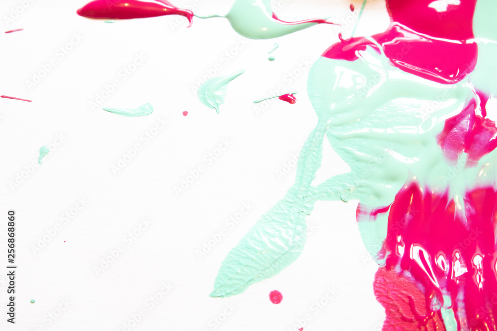 Fototapeta premium Pink And Blue Paint Spatters on White Background