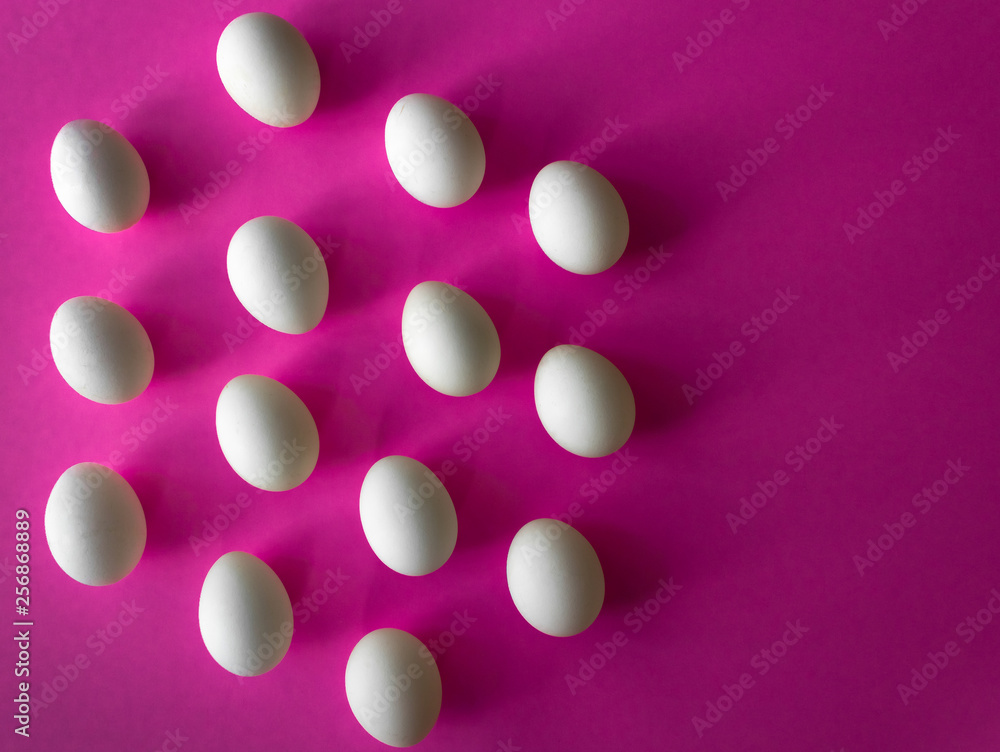 White Easter eggs in hexagon band on purple background White Easter eggs in hexagon band on purple background