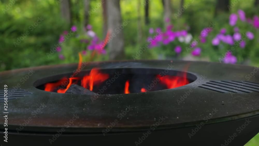 Preparing a new grill for use. Linseed oil on a white cloth. Use of oil