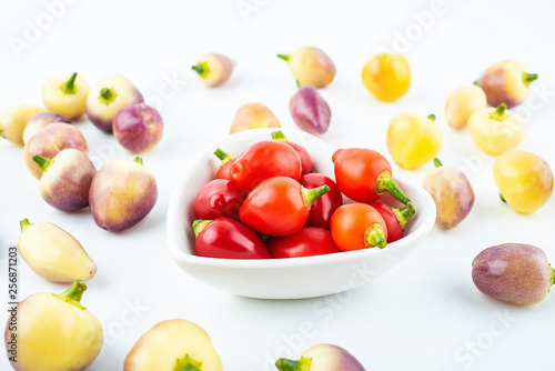 Fototapeta Naklejka Na Ścianę i Meble -  Fresh colorful peppers on white background