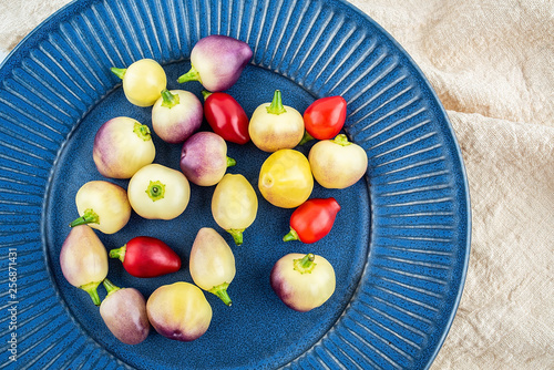 Fresh colorful peppers on a plate