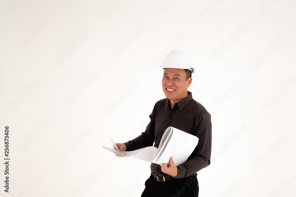 Middle age cheerful male engineer wearing a protective helmet happy working on construction site. Construction Bussiness, happiness concept, isolated on white background Middle age cheerful male engineer wearing a protective helmet happy working on construction site. Construction Bussiness, happiness concept, isolated on white background
