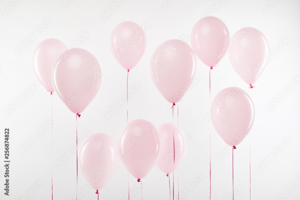 background of decorative pink air balloons isolated on white