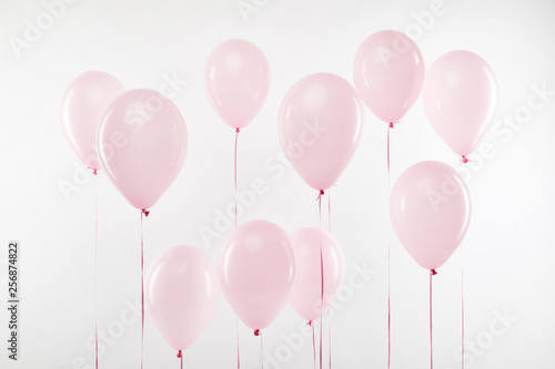 background of decorative pink air balloons isolated on white