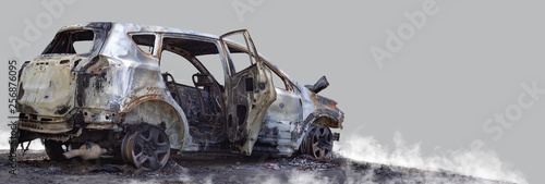 Burnt new car. Isolated on grey background.