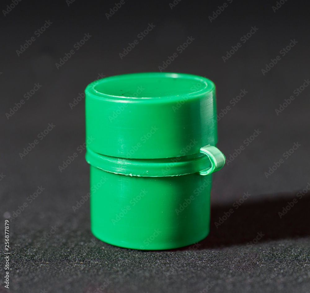 Plastic Film Canisters on dark background for 35mm film photography