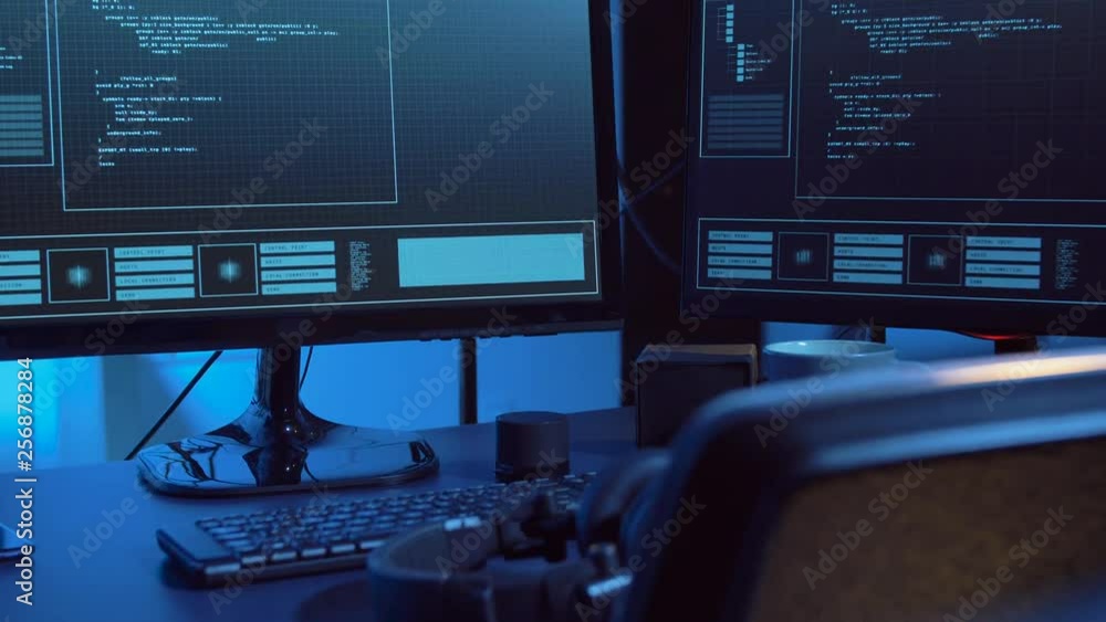 cybercrime and technology concept - hacking of computer system by virus cyber attack in dark room