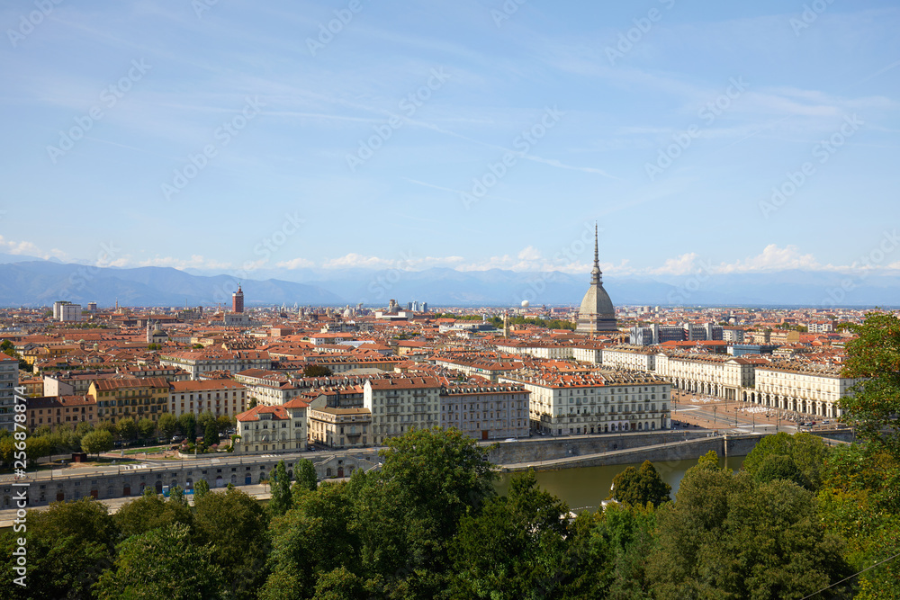 Turin city panoramic view, Mole Antonelliana tower and Po river in a sunny summer day in Italy