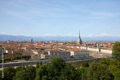 Turin city panoramic view, Mole Antonelliana tower and Po river in a sunny summer day in Italy © andersphoto