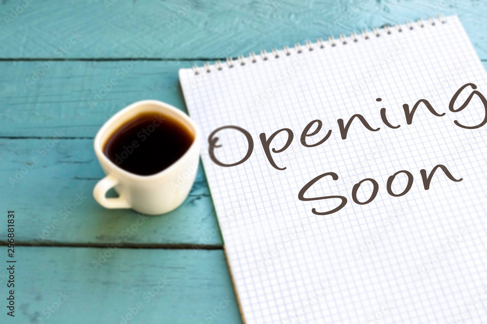 Writing note showing Opening Soon Writing note showing Opening Soon