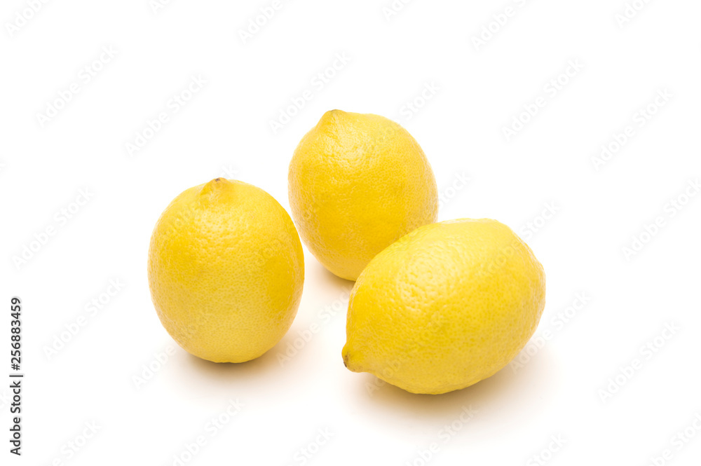 Ripe lemons on a white background, citrus fruits Ripe lemons on a white background, citrus fruits