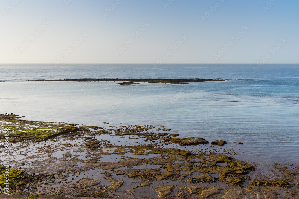 Spain, Lanzarote, Low tide sea landscape of vanishing water Spain, Lanzarote, Low tide sea landscape of vanishing water