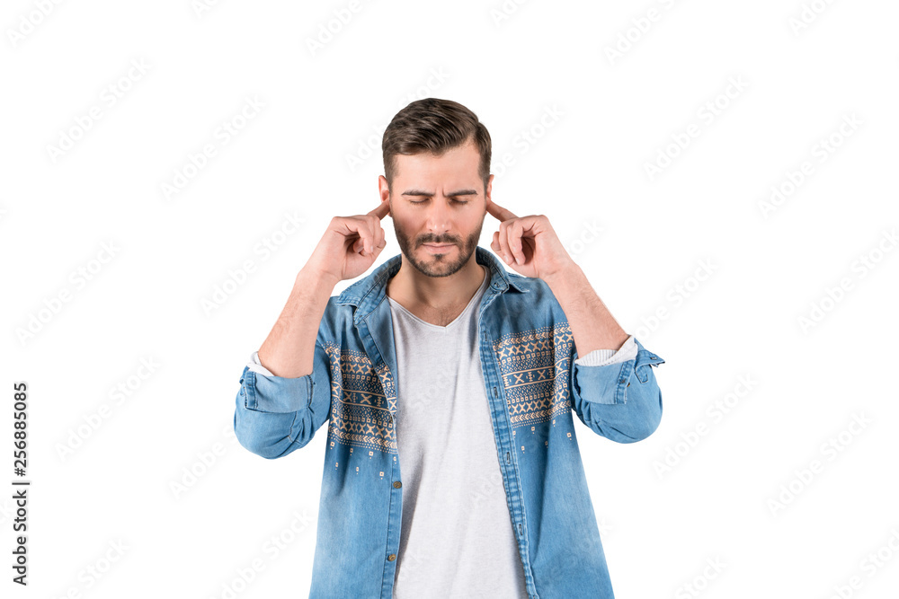 Stressed man covering ears, isolated Stressed man covering ears, isolated