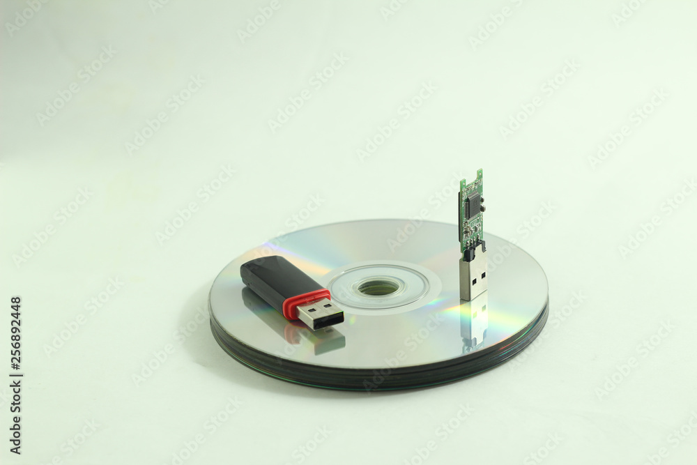 CD disk and flash drive closeup. CD disk and flash drive closeup.