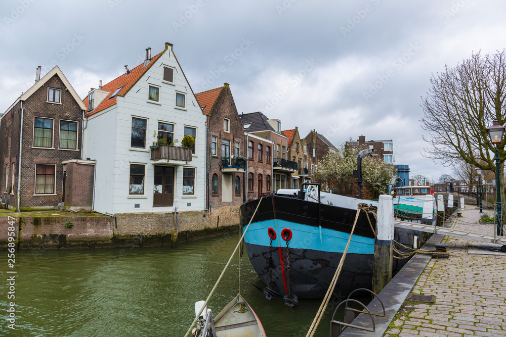 houses on the canal in amsterdam